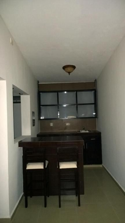 Private studio kitchenette at Hotel Bugambilias