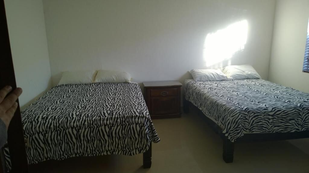Studio for four adults with two full beds at Hotel Bugambilias